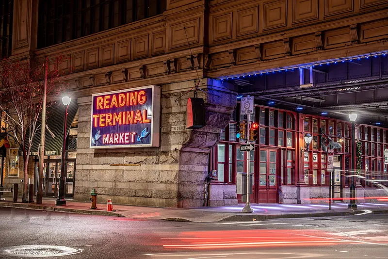 Reading Terminal Market sign and stone facade at night
